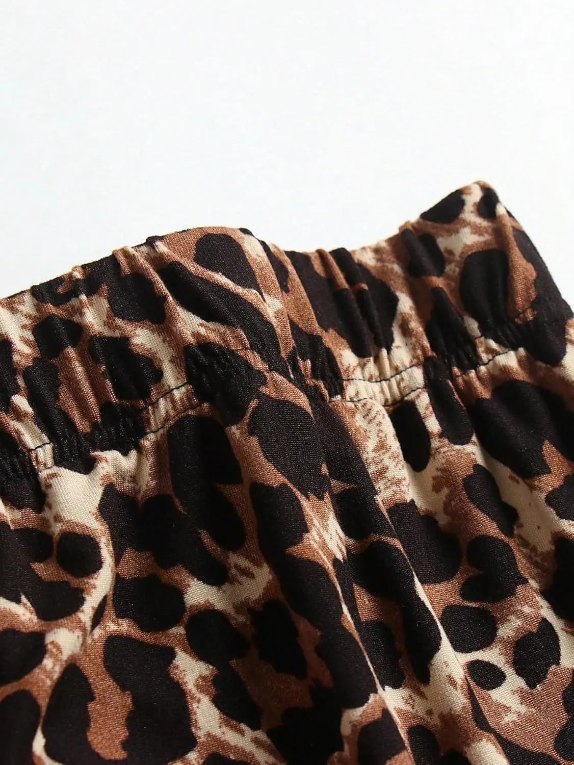 WDIRARA Women's Plus Size Leopard Print Elastic Waist Flare Bell Bottom Ruffle Hem Long Pants